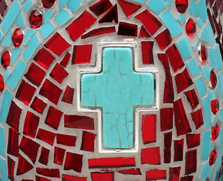Ruby mosaic sculpture, closeup of cross on back